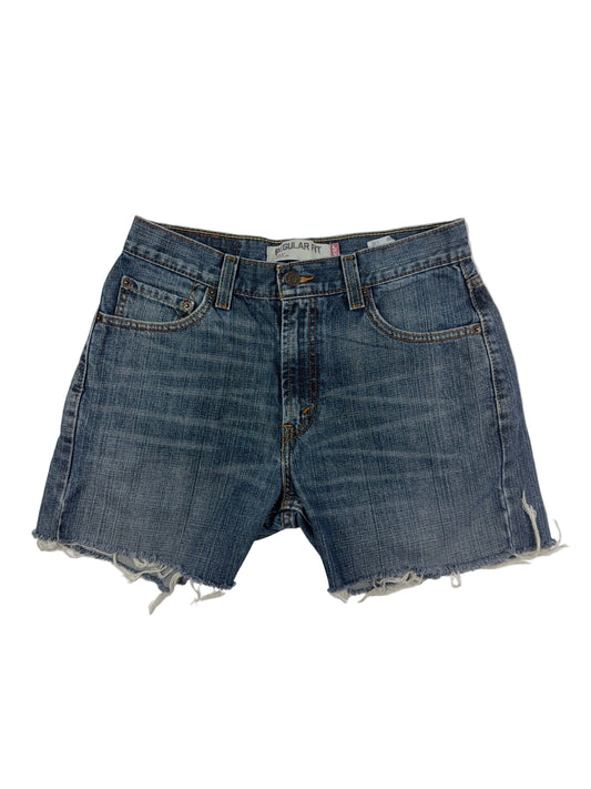 Pair of blue denim shorts on a white background